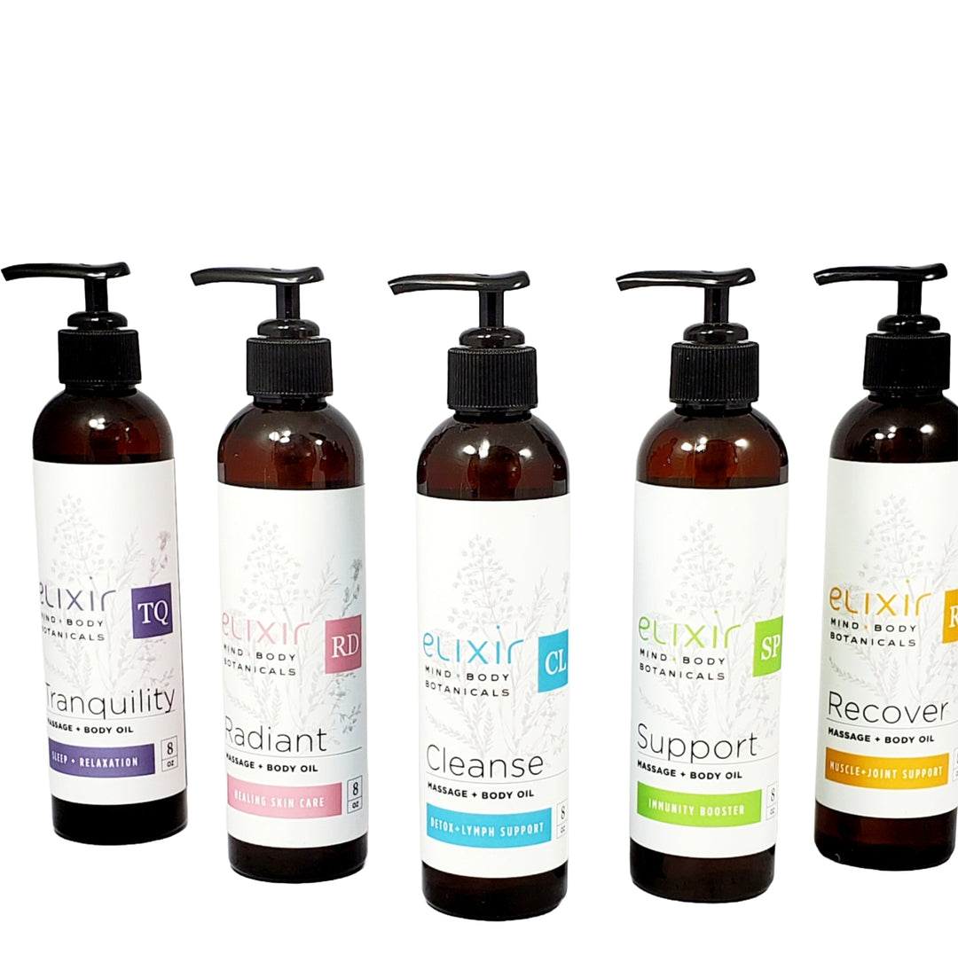5 amber pump bottles of each scent of the Elixir Mind Body Botanicals Massage and Body Oils
