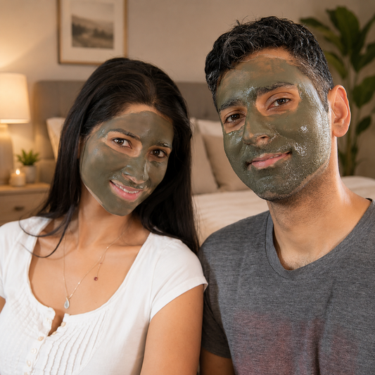 A couple having a spa day at home with an Elixir mud mask