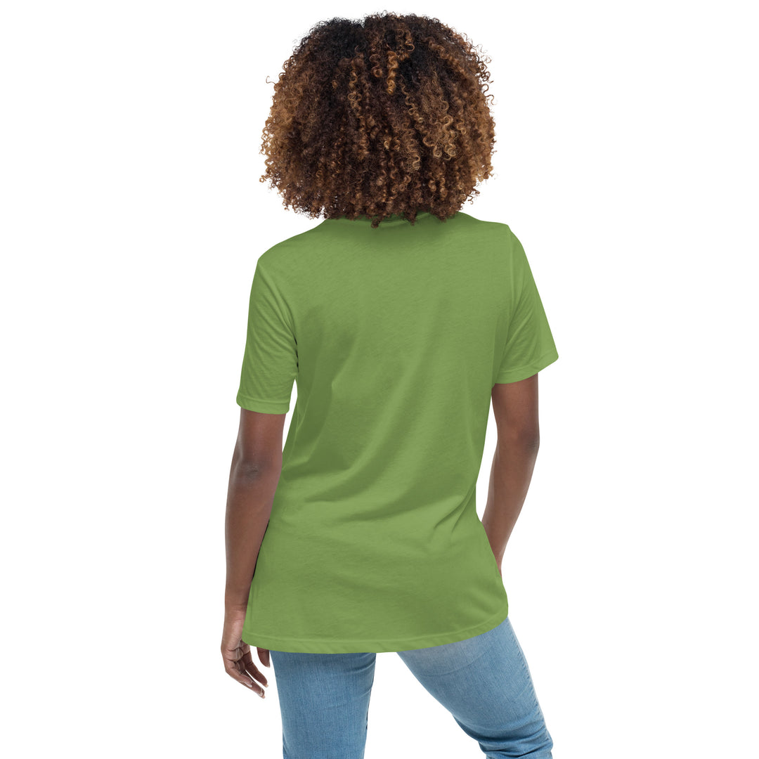 Back view of a smiling woman wearing her relaxed light green short-sleeved t-shirt 