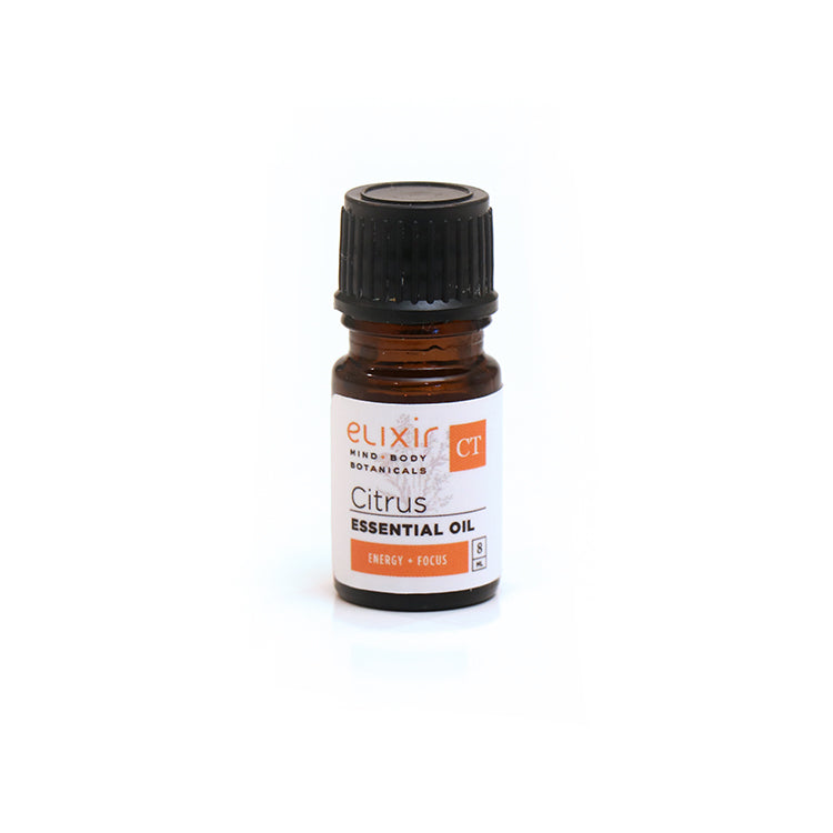 A small bottle of Elixir Mind Body Botanicals Citrus Essential Oil on a white background