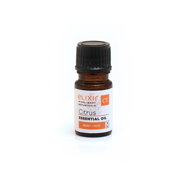 A small bottle of Elixir Mind Body Botanicals Citrus Essential Oil on a white background