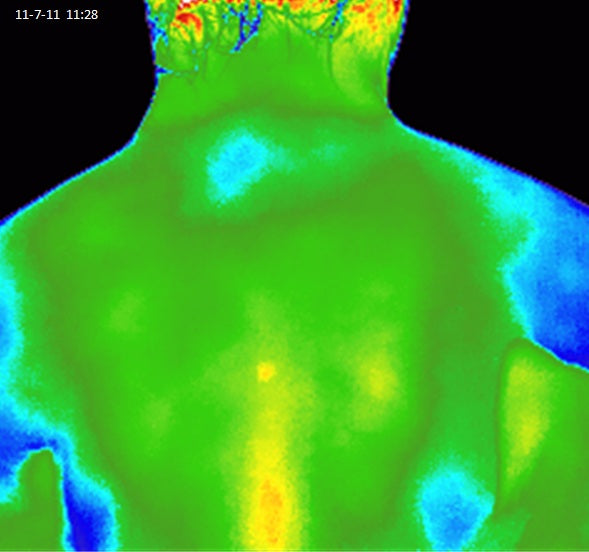 Cooling image of a person's back using Elixir Mind Body Botanicals Relief Balm