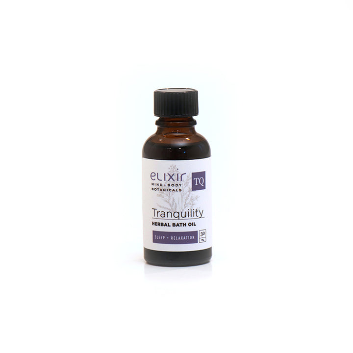 A 30 ml bottle of Elixir Mind Body Botanicals Tranquility Herbal Bath Oil on a white background