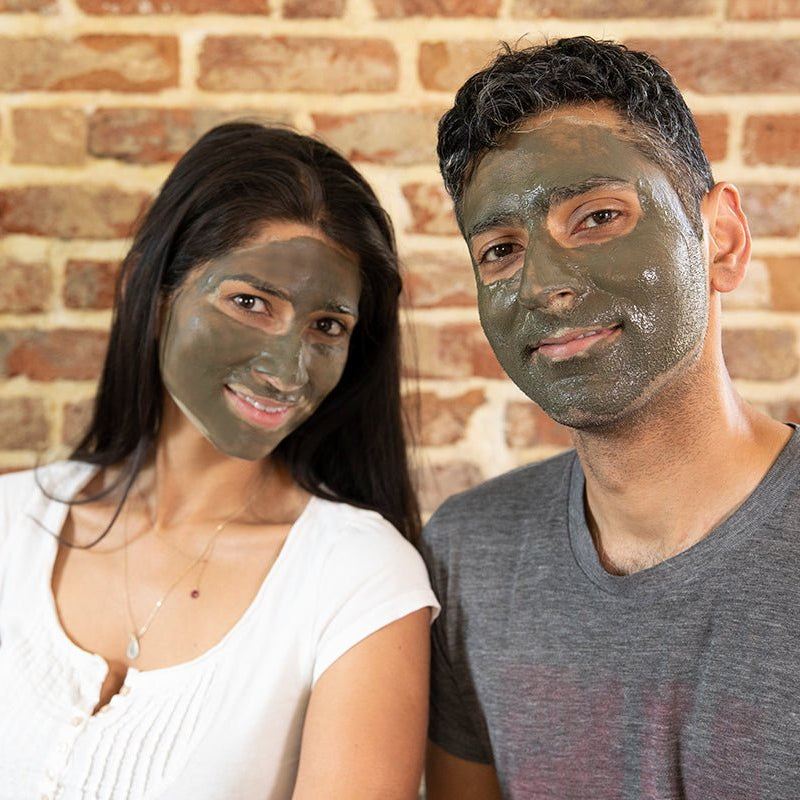 A couple having a spa day together at home using Elixir Mind Body Botanicals Mineral Mud Mask from Elixir Mind Body Boutique
