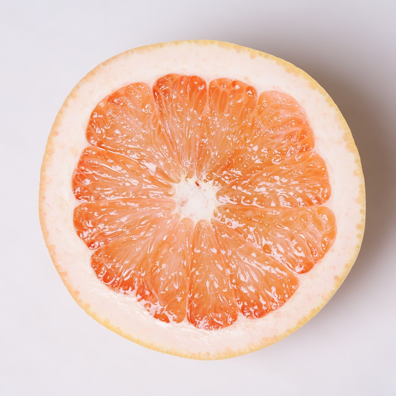 Grapefruit essential oil used in Elixir Mind Body Botanicals Recover Massage + Body Oil at Elixir Mind Body Boutique