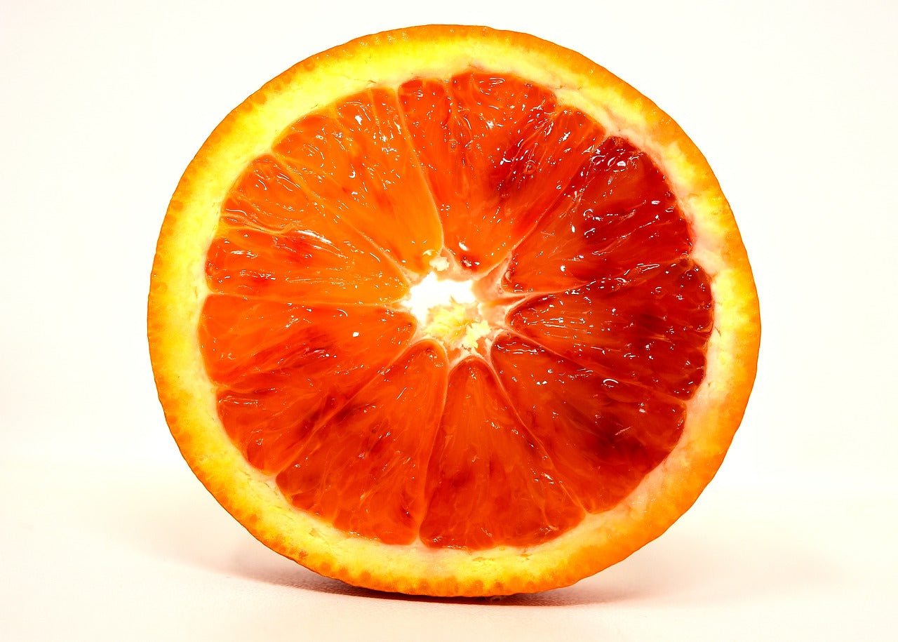 Blood Orange essential oil used in Elixir Mind Body Botanicals Tranquility Massage + Body Oil at Elixir Mind Body Boutique
