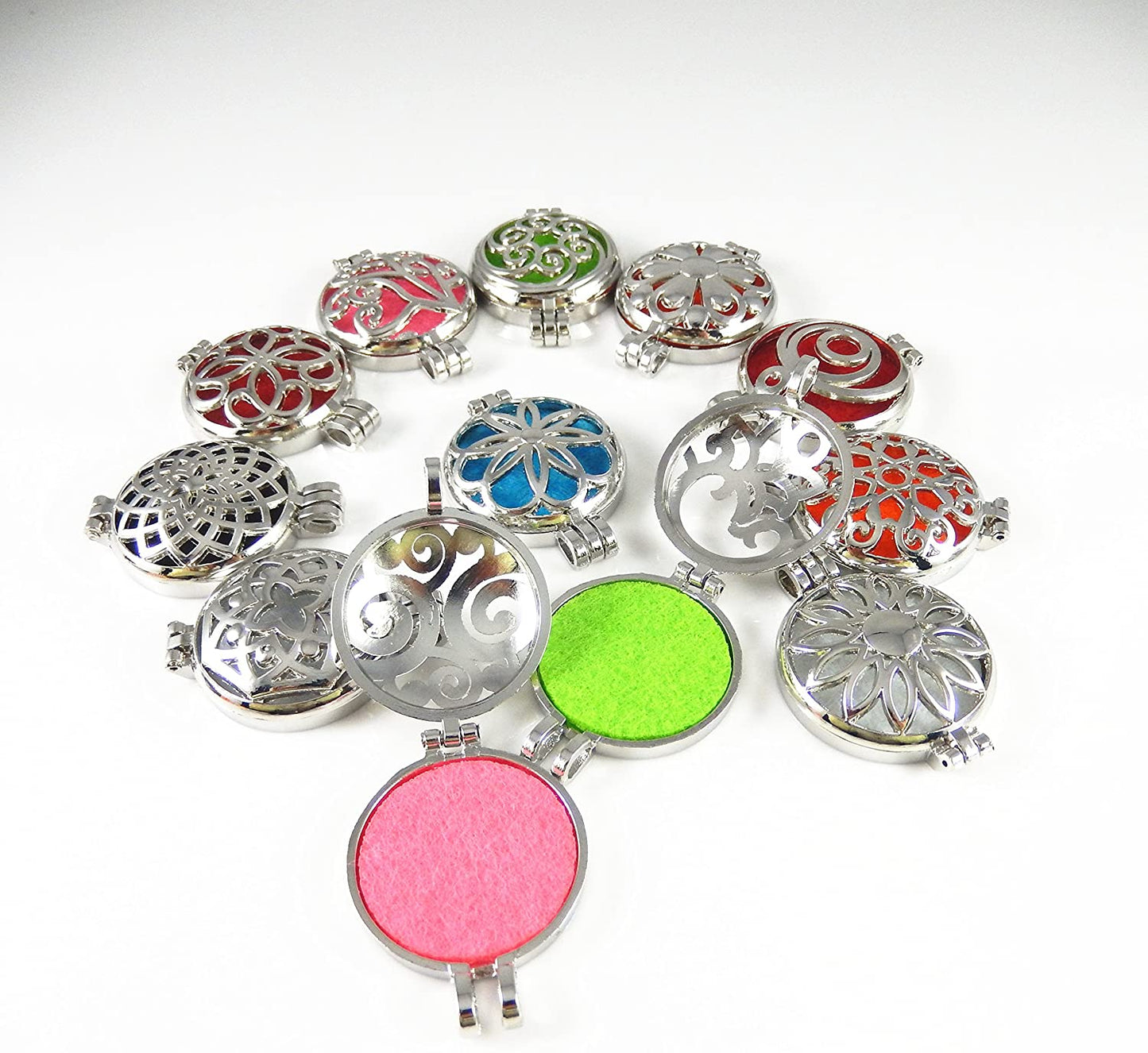 Selection of Essential Oil Diffuser Lockets with refill pads available from Elixir Mind Body Boutique