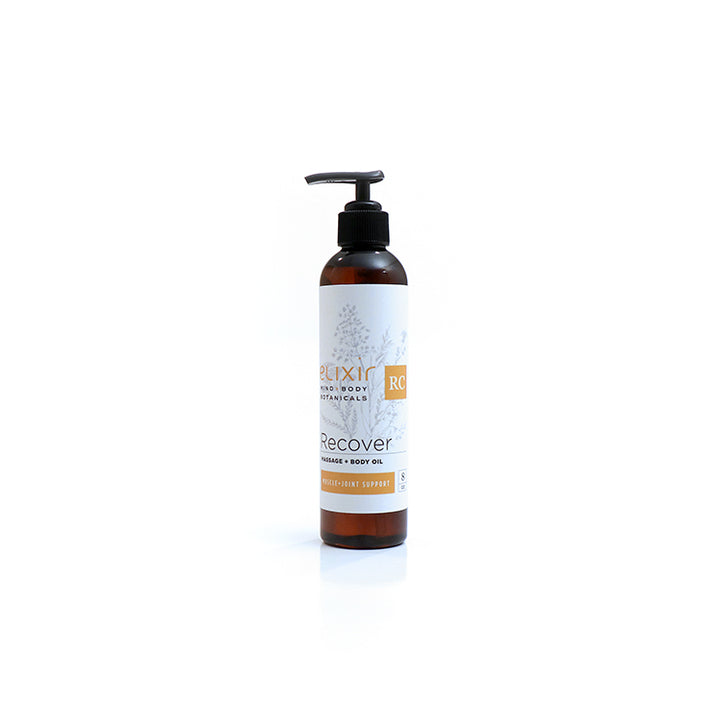 A pump bottle of Elixir Mind Body Botanicals Recover blend Massage and Body Oil on a white background